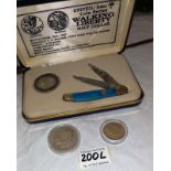 A boxed collectors coin and knife series set 'Walking Liberty Dollar' and other American coins.