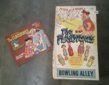 A rare welsotoys, the flintstones bowling alley, and colour by numbers book.