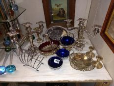 A quantity of silver plate including glass lined bowls & pair of candelabra etc.