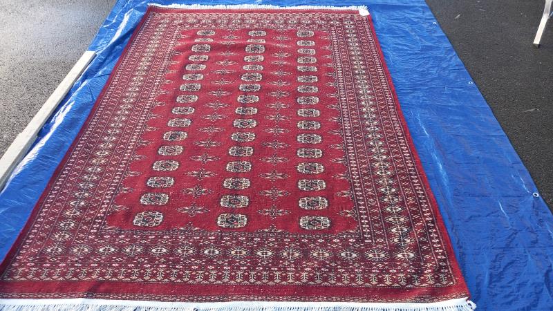 A large red patterned carpet - 247cm x 173cm (COLLECT ONLY) - Image 2 of 3