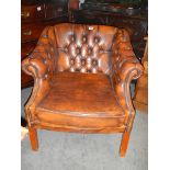 A good quality tan leather deep buttoned arm chair. COLLECT ONLY.