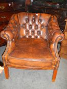 A good quality tan leather deep buttoned arm chair. COLLECT ONLY.