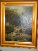 A late Victorian oil on canvas featuring a waterfall. 63 x 76 cm.