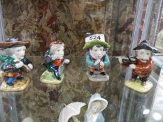 A set of four figures of Dwarfs.