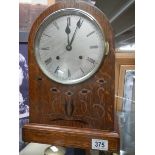 An 8 day graduated quarter striking bracket clock on 2 gongs, silver 7" dial, working order,