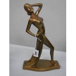 An art deco plaster figurine, Registration No. 809187 (repainted).