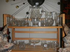 A mixed lot of cut glass jugs, glasses etc.,