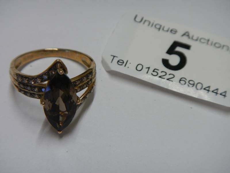 A 9ct gold ring set amethyst coloured stone, size S, 4 grams. - Image 8 of 8