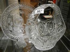 A cut glass basket and a cut glass bowl.