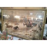 A large gilt framed print of dogs robbing the butchers boy.