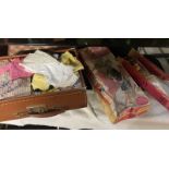 A vintage boxed Sindy Doll & others & a case of clothing