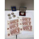 Six ten shilling notes, £5 coins etc.,