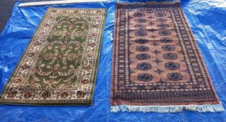 A green patterned rug - 150cm x 80cm & 1 other rug - 90cm x 165cm (COLLECT ONLY)