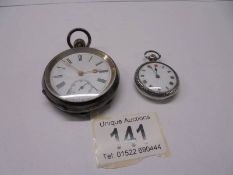 A silver pocket watch and a silver fob watch.