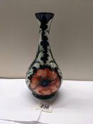 A 1996 Moorcroft poppies vase.
