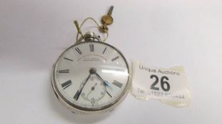 A silver Fusee pocket watch, London 1875, with key, white dial, in working order.