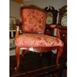 A mid 20th century carver chair in good condition.