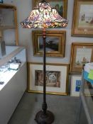 A standard lamp with Tiffany style shade in good condition, COLLECT ONLY.