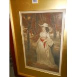 An early 20th century signed print of a lady in woods signed Frank Strasburg, 58 x 78 cm.