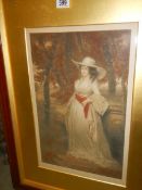 An early 20th century signed print of a lady in woods signed Frank Strasburg, 58 x 78 cm.