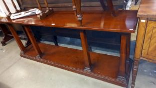 A long Edwardian mahogany wall unit on 6 tapered pillar legs COLLECT ONLY.