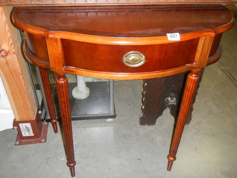 A modern mahogany hall table.