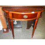 A modern mahogany hall table.