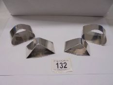 Four hall marked silver napkin rings, 5.5 ounces/
