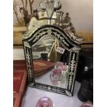 An ornate Gypsy style mirror - 30cm x 52cm