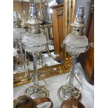 A pair of Victorian Hukin & Heath silver plated oil lamps (burners converted to electric)