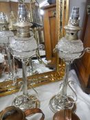 A pair of Victorian Hukin & Heath silver plated oil lamps (burners converted to electric)