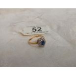 A diamond and sapphire cluster ring, dated and hall marked Birmingham 1967, size N half, 3.4 grams.