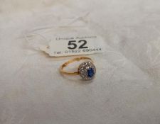 A diamond and sapphire cluster ring, dated and hall marked Birmingham 1967, size N half, 3.4 grams.