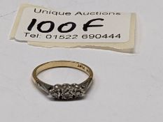 An 18ct gold ring set three good diamonds, size L, 2.4 grams.