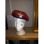 A vintage parachute Regiment beret with cap badge (head not included)
