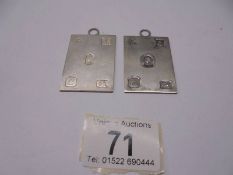 Two hall marked silver medallions. 35 grams.