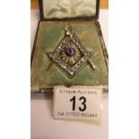 A Masonic jewelled pendant.