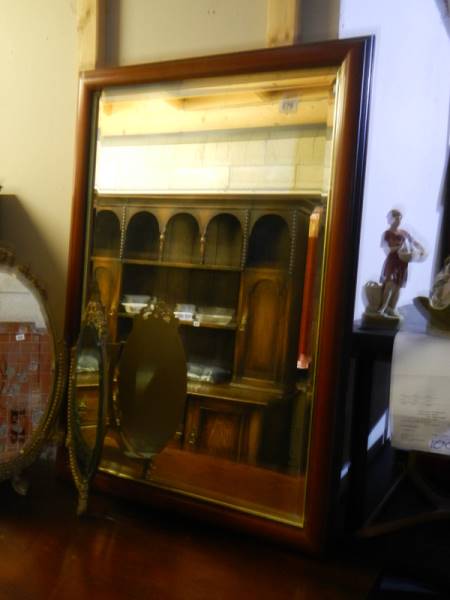 A mahogany framed bevel edged mirror.