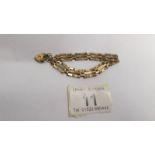 A 9ct gold gate bracelet with padlock, 7.2 grams.