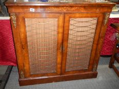 A Victorian mahogany inlaid two door cabinet with brass grills to doors. COLLECT ONLY.