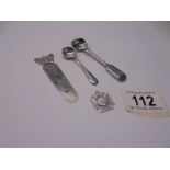 A silver salt spoon, mustard spoon, bookmark and fob, 33.7 grams.