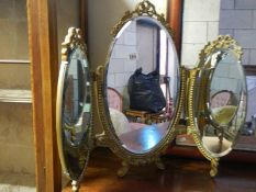 A triple dressing table mirror.