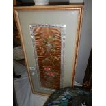 A framed and glazed Chinese silk embroidery.