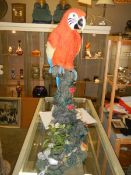 A large statue of a macaw. COLLECT ONLY.