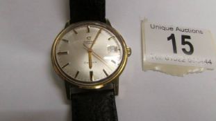 An Omega Geneve automatic, Cal 565, 24 jewelled, champagne dial, gold coloured case, 35mm diameter,