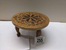 An apprentice piece inlaid circular table.