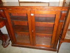 A two door Victorian book case.