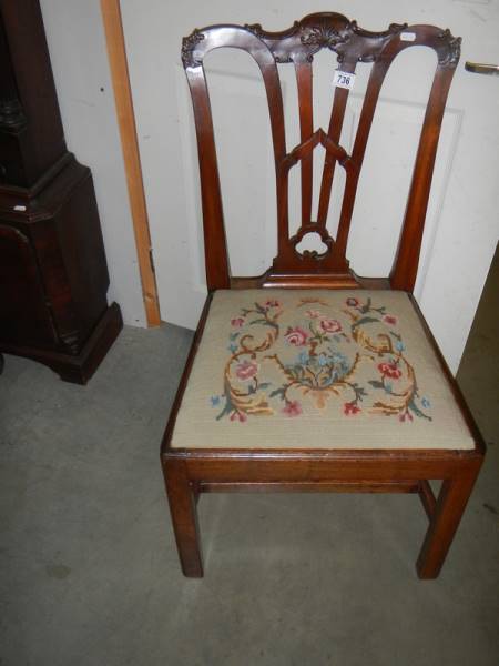 A Georgian style mahogany dining chair with embroidered seat.