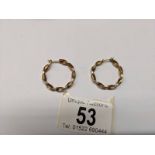 A pair of 9ct gold twisted design hoop earrings, 2.3 grams.