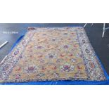 A mustard coloured patterned carpet - 300cm x 245cm (COLLECT ONLY)